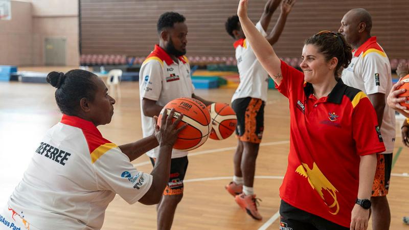 Lieutenant Jo Mercieca mentors local Basketball coaches during an ADF Sports training program at the Taurama Aquatic and Indoor Centre, Port Moresby, Papua New Guinea. Photos: Leading Seaman Matthew Lyall
