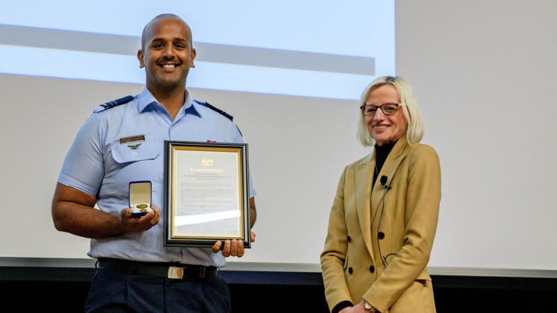 Flight Lieutenant Shiva Tejwani being presented with a Gold Defence Commendation for Technical Member of the Year by First Assistant Secretary Major Surface Combatants & Combat Systems Sheryl Lutz at the EngTech 23 Conference.