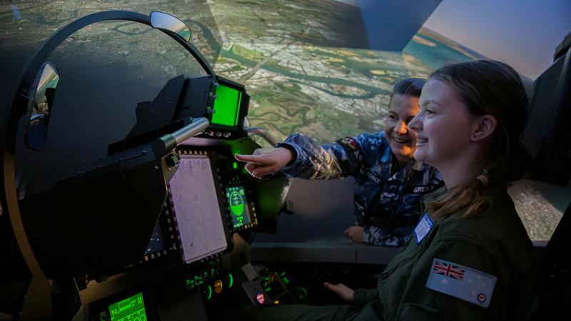 Air Force’s women in aviation program participant Belicia experiences flying in the FA-18F Super Hornet Simulator at RAAF Base Amberley, Queensland. Photos: Leading Aircraftwoman Taylor Anderson