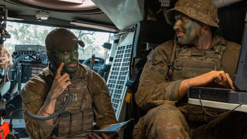 Royal Australian Air Force Leading Aircraftman Aiden Crick and Australian Army Bombardier Lachlan Fairweather from the tactical air control tarty reports on air ground assets during Exercise Diamond Strike, in the lead up to Exercise Talisman Sabre 23.