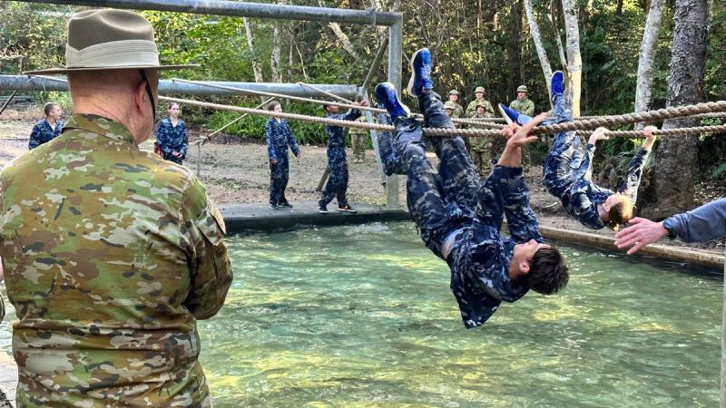 Patron of ADF Cadets, Sir Peter Cosgrove (Retd) observes the Australian Air Force Cadets team complete the rope crawl obstacle in the confidence course at the Chief of Army Cadet Team Challenge at Kokoda Barracks, QLD.