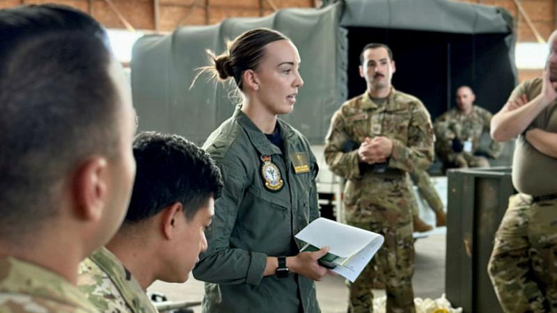 RAAF aviator presents to a group of USAF personnel