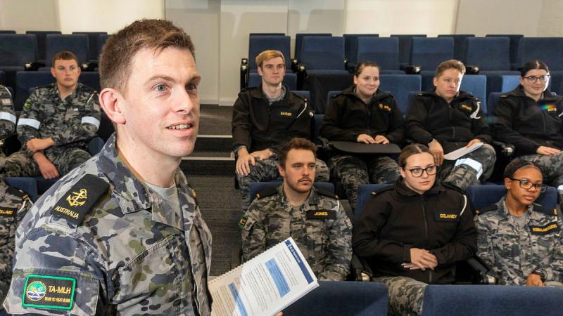Leading Seaman Bradley Harris instructs students.