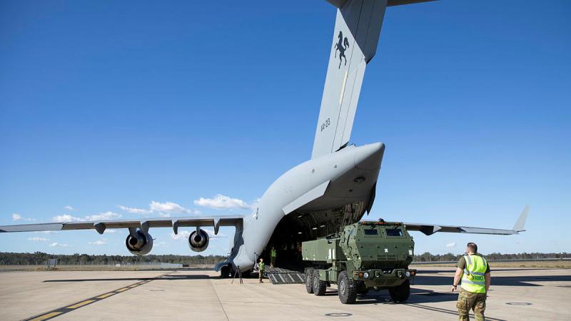 A high mobility artillery rocket system is loaded on to a C-17A Globemaster.