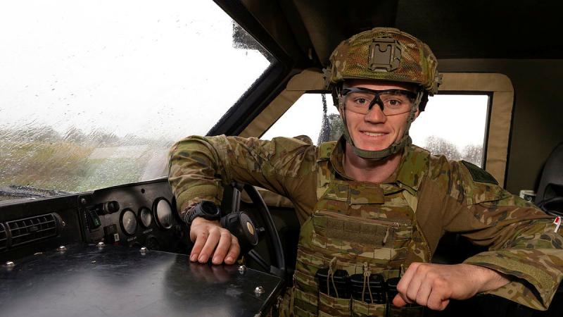 Private Jeremy Janson in a Bushmaster vehicle.