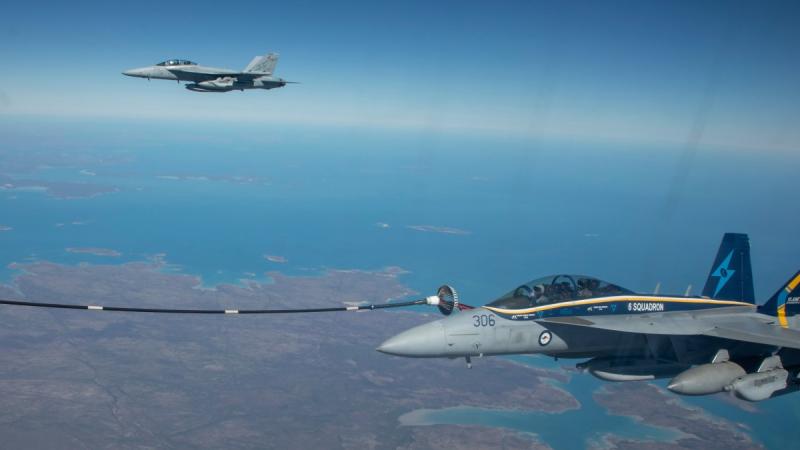 E/A-18G Growlers from No. 6 Squadron conduct Air to Air refueling.