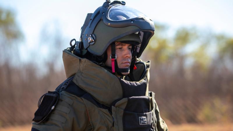 Royal Australian Air Force explosive ordnance disposal technician Sergeant Troy Garland from 65 Air Base Recovery Squadron prepares to conduct a simulated improvised explosive device training drill at RAAF Base Curtin, Western Australia, during Exercise Talisman Sabre 2023.