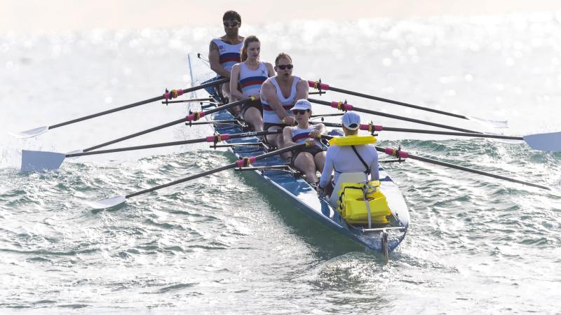 From left, LCDR Lachlan DarFrom left, Lieutenant Commander Lachlan Darrow, Seaman Caitlin Hartley, Major Matthew Jones, Squadron Leader Sarelle Woodward and Musician Benjamin Lim at the Australian Coastal Rowing and Beach Sprints Championships.row, SMN Caitlin Hartley, MAJ Matthew Jones, SQNLDR Sarelle Woodward and MUSN Benjamin Lim battle the waves as they take part in an event at the Australian Coastal Rowing and Beach Sprints Championships.