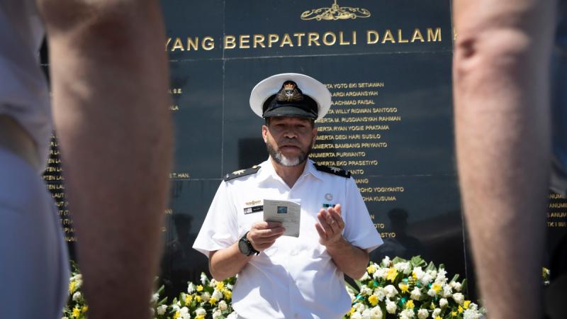 Royal Australian Navy Imam Mogamat Majidih Essa conducts a prayer on a visit to the KRI Nanggala Memorial in Surabaya Indonesia during Indo-Pacific Endeavour 2023.