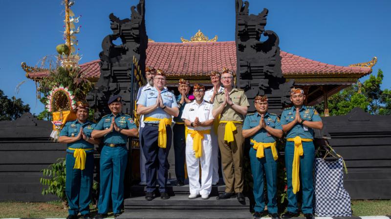 Australian Defence Force Chaplains, Rainer Schack, Andrew Robinson, Christopher Buckley-Wilkshire, Imam, Mogamat Majidih Essa and Commander Mark Graichen visit a Hindu temple with members of the Indonesian Navy in Surabaya, Indonesia during Exercise Indo-Pacific Endeavour 2023.