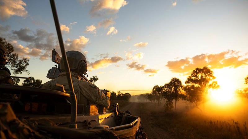 Tank driving in the field. 