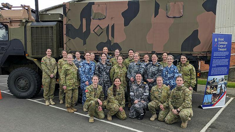  Female soldiers, sailors and aviators from the ADF with an HX-77 Army vehicle at the Fearless Festival in Devonport, Tasmania.