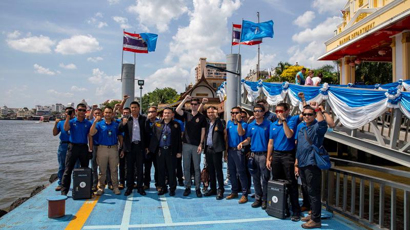 Members from the AFP, ABF and Thai Maritime Enforcement Command Center stand together during a group photo.