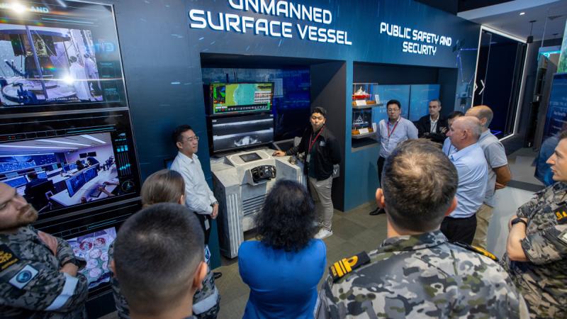 Royal Australian Navy members and representatives from Defence Science Technology group during a visit to ST Engineering in Singapore as part of Indo Pacific Endeavour 2023.