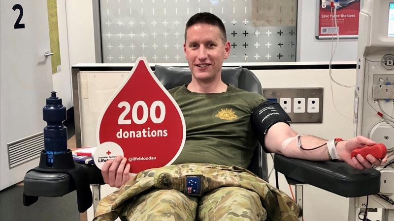Army School of Ordnance distribution operator instructor Sergeant Matthew Moran rolls up his sleeves for his 200th plasma donation at Albury Lifeblood on 14 June 2023.