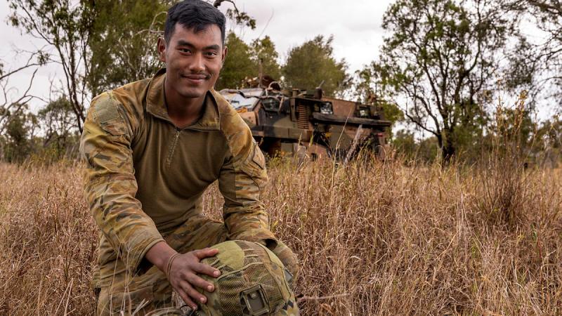 Private Mesak Hlawng Sang holding his equipment during Exercise Talisman Sabre 2023