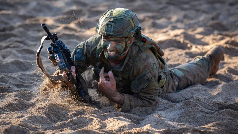 An Australian Army soldier completes the obstacle course during the 2023 Duke of Gloucester Cup in Singleton