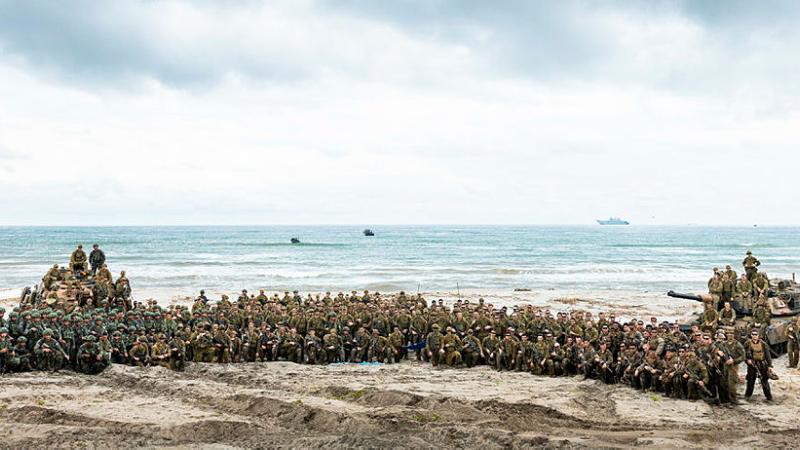 A Ground Combat Element made up of ADF personnel, US Marines and Armed Forces of the Philippines soldiers on completion of a combined amphibious assault exercise during Exercise Alon in the Philippines. 