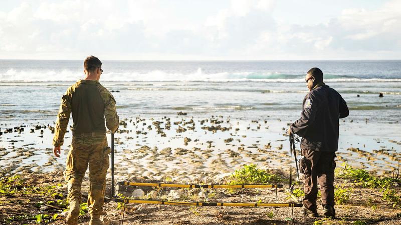  Corporal Joel Macmillan and Constable Armstrong Ragoso survey the coastline