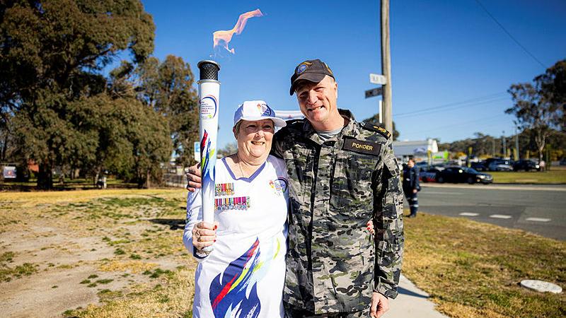 Petty Officer Daryl Ponder and his mother Margaret take part in the Legacy Relay in Goulburn, NSW.