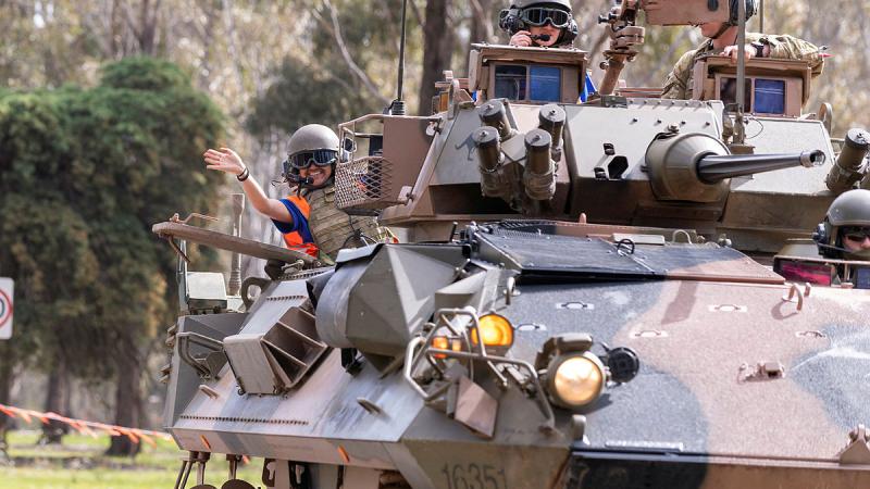 Students go for a ride in a Australian Light Armoured Vehicle.