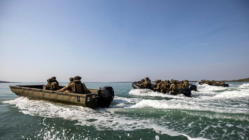 Australian Army soldiers from the 1st Brigade and the Armed Forces of the Philippines travel by Zodiac small craft from Darwin to Channel Island, NT, to conduct an assault as part of Exercise Predator's Run