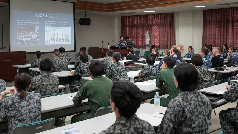 RAAF officer, Flight Lieutenant Rosemary Callery, addresses the attendees of the Women, Peace and Security networking event at Japan Air Self-Defense Force Komatsu Air Base during Exercise Bushido Guardian. 