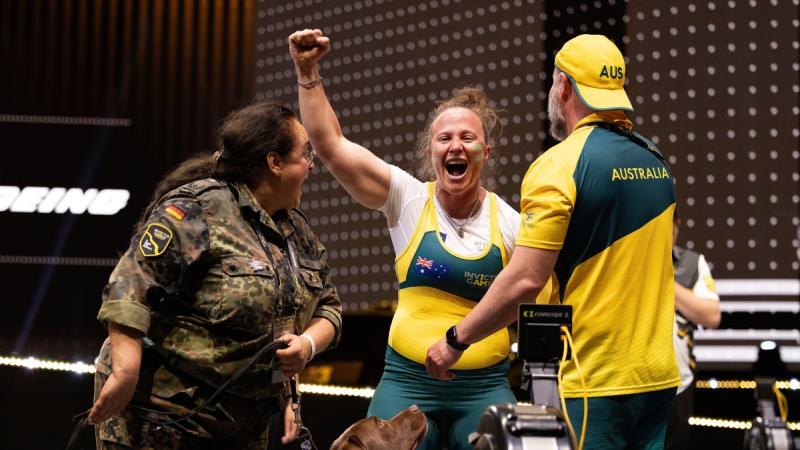Taryn Dickens celebrates winning gold
