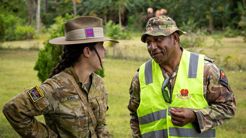 Australian Army officer Captain Helena Sorial speaks with Papua New Guinea Defence Force officer Lieutenant Paka during Exercise Puk Puk 2023 on Lombrum Naval Base, Papua New Guinea. Photo: Corporal Brandon Grey