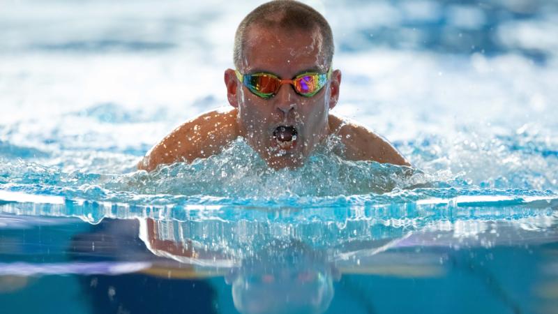 Flight Sergeant Nathan King swimming
