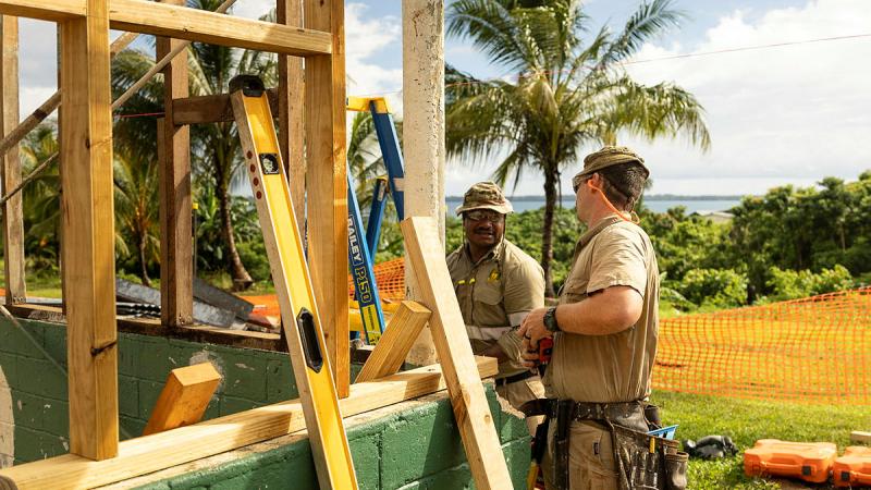 An Australian Army Sapper and a soldier of the Papua New Guinea Defence Force renovate a school during Exercise Puk Puk, on Manus Island, Papua New Guinea. 