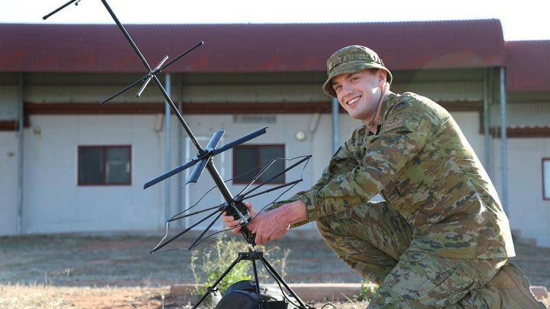 Signaler Matthew Crawford of 8 Signals Regiment helps 144 Signal Squadron test their HF capability during Exercise Rhino Run. 