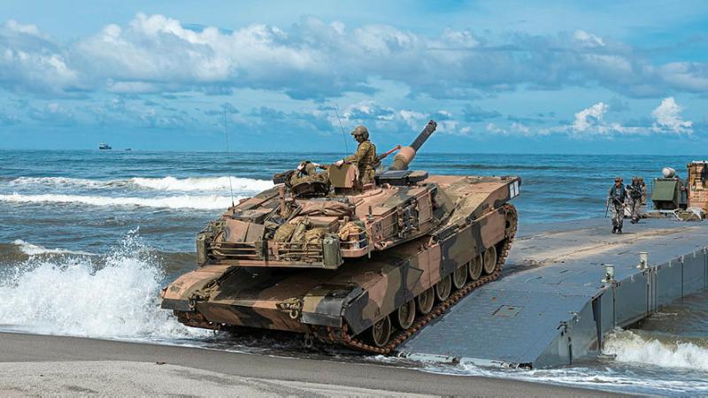An Abrams tank drives onto the shore in the Philippines.