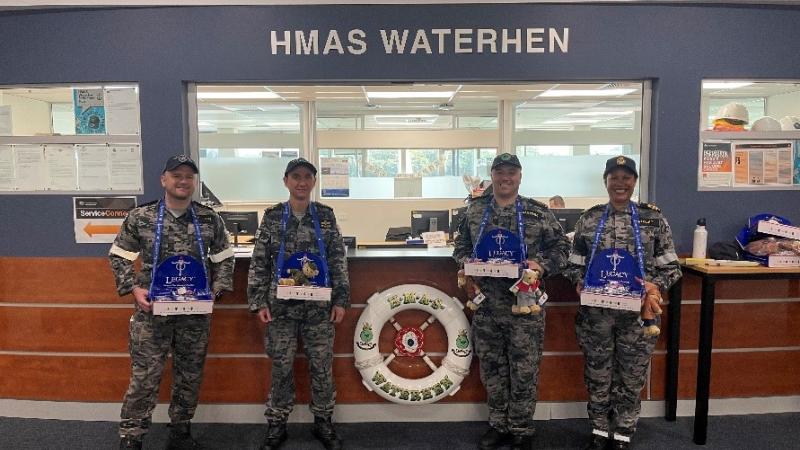 From left, Seaman Marine Technician Joshua Love, Chief Petty Officer Marine Technician Ashley Schmidt, Able Seaman Marine Technician Jason Martinez and Lieutenant Shanna Stocks.