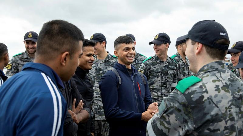 Personnel from the Royal Australian Naval College host Indian Navy officers and sailors at HMAS Creswell