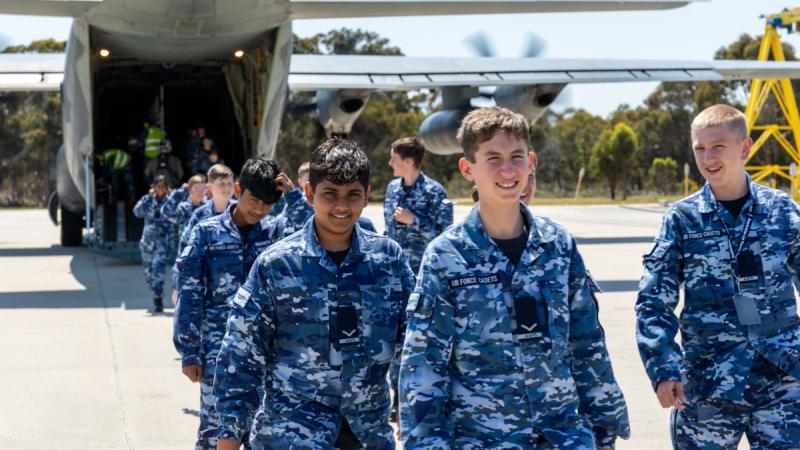 Australian Air Force Cadets disembark a C-130J Hercules at RAAF Base Pearce after a familiarisation flight.