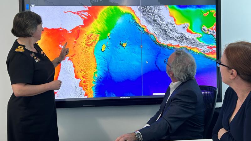 Hydrographer of Australia, Commodore Robyn Phillips, Australian Hydrographic Office (AHO) Director Maritime Data Management, Mr Doug White, and AHO Director Maritime Relationships and Governance, Mrs Nat McLean, using the newly launched Australian Bathymetric and Topography Grid.