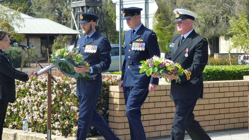 ADF personnel lay wreaths at the memorial. 