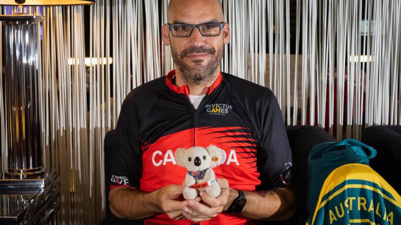 Master Corporal James Gendron and Hoppy the Koala.
