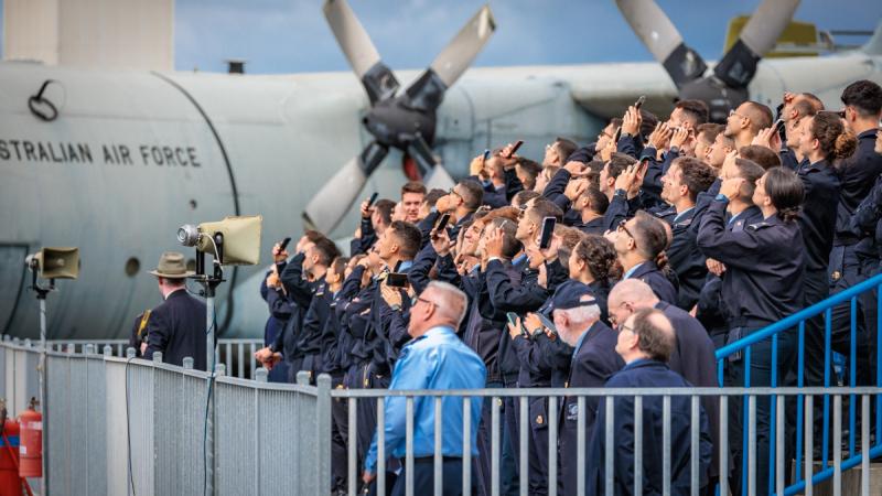 A delegation from the Italian Air Force (Aeronautica Militare) Academy watch a 100 Squadron flying display at RAAF Base Point Cook, Victoria.