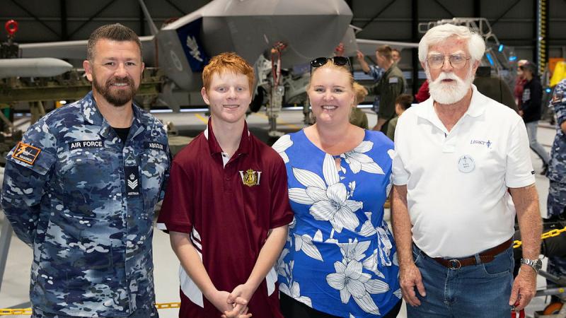 From left, Flight Sergeant Aaron Absolon with Hunter Legacy Youth member Alex Hobson, Victoria Hopkins and President Paul Rees during a tour of the F-35A Lightning II at 3 Squadron, RAAF Base Williamtown, NSW.