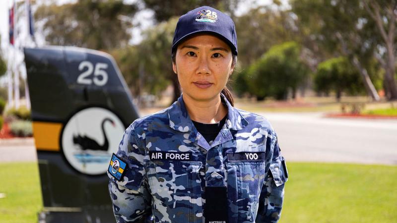 25 Squadron personnel capability specialist Aircraftwoman San Yoo in front of 25 Squadron Headquarters, at RAAF Base Pearce, WA. 