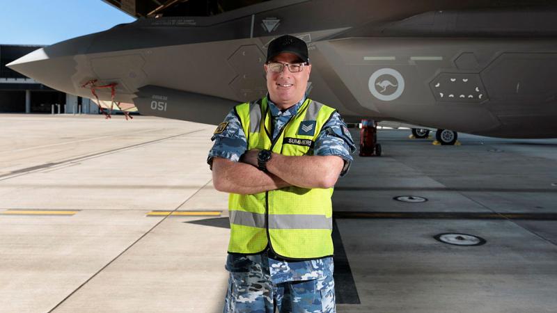 Sergeant Andrew Summers in front of a F-35A Lightning II at 2 Operational Conversion Unit, RAAF Base Williamtown, NSW. 