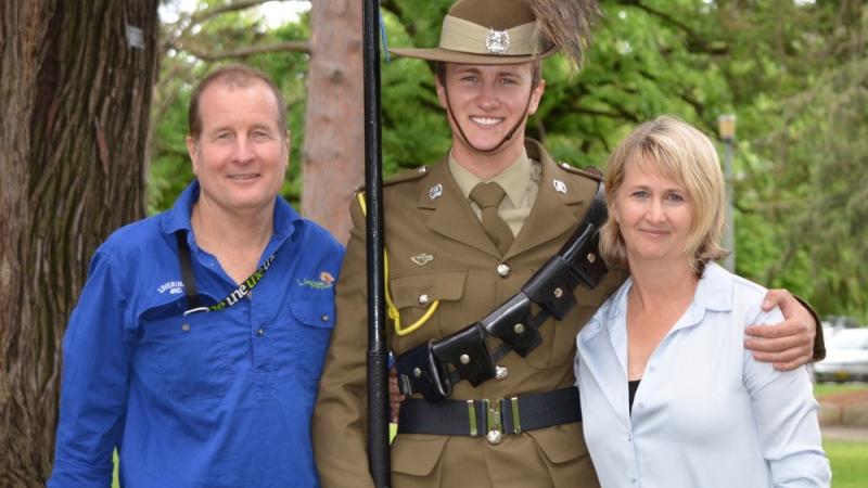 Australian Army Reserve Trooper Liam Lamb from 12th/16th Hunter River Lancers cavalry regiment prepares for the freedom of entry to Armidale on October 28 alongside his parents Professor David Lamb and Jane Lamb.