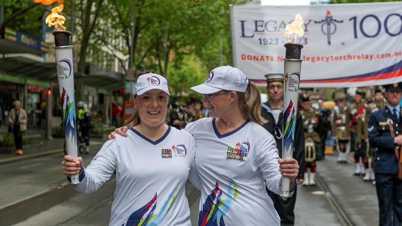 Legacy torchbearers Emily Lahay and Commander 4th Brigade, Brigadier Michelle Campbell during the last leg of the Legacy Centenary Torch Relay in Melbourne. 