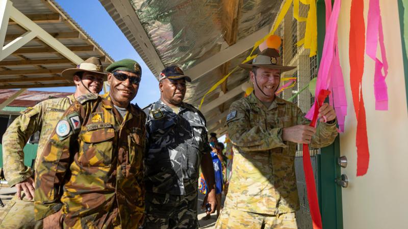 Commander 3rd Brigade Brigadier David McCammon (right) officially opens newly renovated classrooms with PNGDF representatives during the closing ceremony of Exercise Puk Puk on Manus Island, Papua New Guinea.