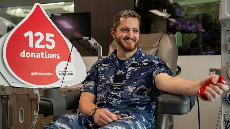 Flight Lieutenant Geordie Jacobs preparing to donate at the at the Lifeblood donation centre Civic, Canberra. 
