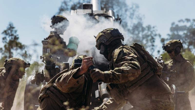 Australian Army gunners from 4 Regiment, Royal Australian Artillery, fire the M777A2 155mm howitzer during Exercise Nadzab at Townsville Field Training Area. 