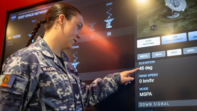 Royal Australian Air Force Corporal Allison Gray, an intelligence analyst at Space Command, at the Space Command offices, Canberra.