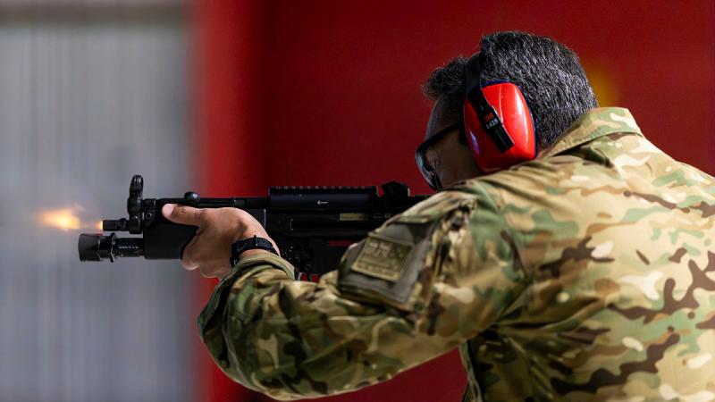 A New Zealand Army soldier fires a Heckler & Koch MP5 submachine gun.